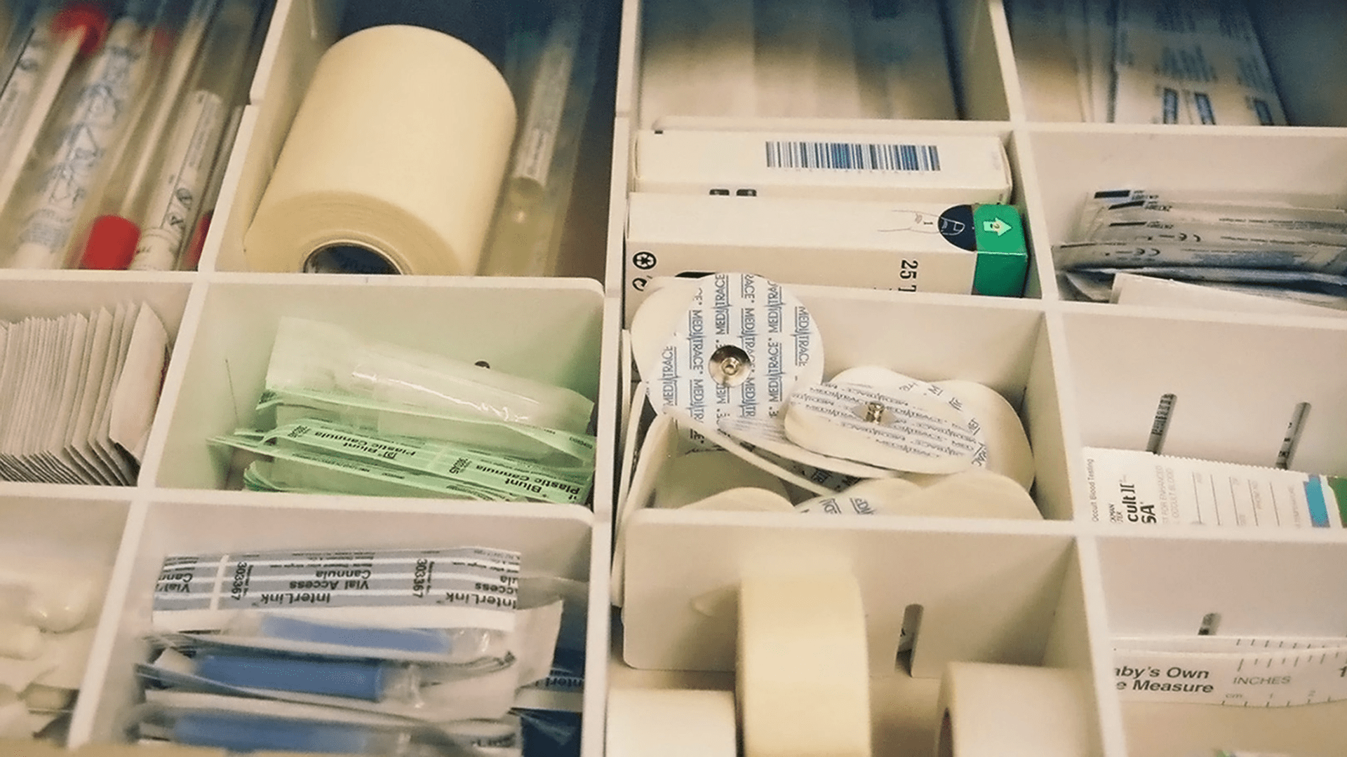 FDA-approved hospital supplies including medical tape, electrodes, and syringes