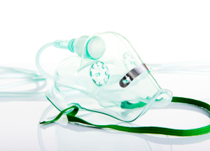 Oxygen mask with attached tubing used for medical oxygen therapy